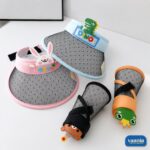 Colorful kids sun visor caps featuring dinosaur and bunny characters with mesh brims