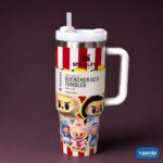 Two Labubu Stanley Tumbler Quenchers in pink and red-stripe patterns with cartoon graphics and ergonomic handles. - view 3