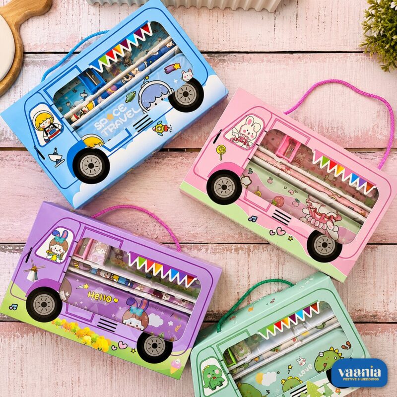 Colorful Bus Stationery Sets in blue, pink, purple, and green on a wooden surface.