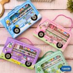 Colorful Bus Stationery Sets in blue, pink, purple, and green on a wooden surface.