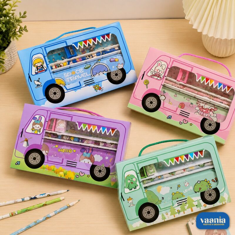 Colorful Bus Stationery Sets in blue, pink, purple, and green on a wooden surface. - view 2