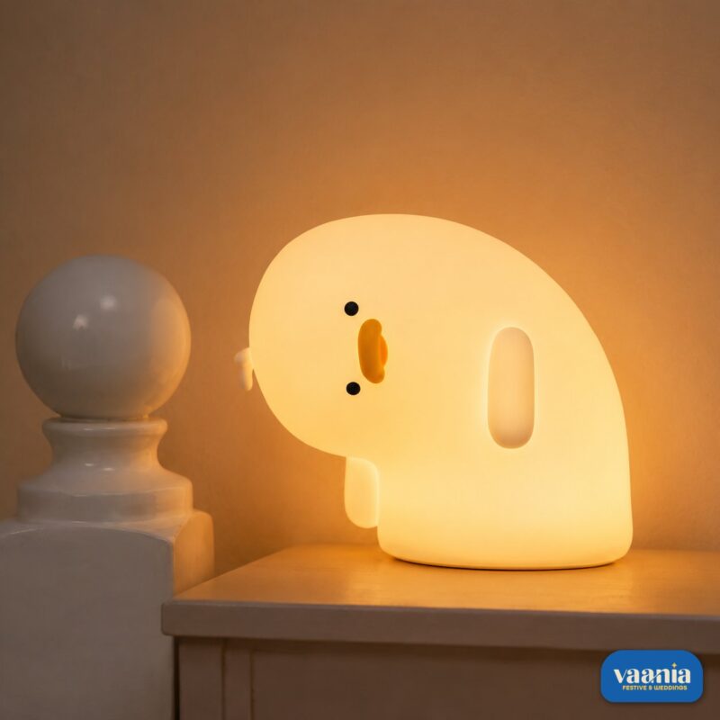 A glowing Why Duck Silicone Night Lamp resting inside a warm arched wall niche. - view 2