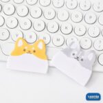 Four packs of Zoo Series Sticky Notes featuring Koko Puppies, BuBu Bears, Kiki Kittens, and BiBi Bunnies on a desk. - view 6