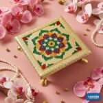 Three golden Metal Leg Chowkis with colorful floral patterns and curved brass feet on a pink backdrop. - view 4