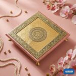 A stack of three tiered Copper Chowkis with ornate golden engravings and pink borders on a pink background. - view 4
