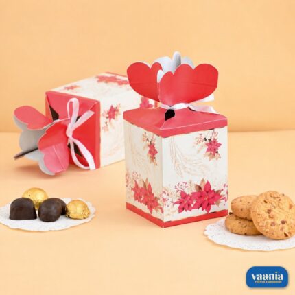 Two floral patterns Multi Purpose Boxes displayed with cookies and chocolates on a light orange background.