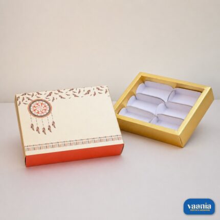A decorative Sliding Box - Cavity Box with a dreamcatcher design and six gold-bordered internal compartments.