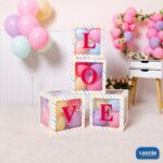 Four stacked Multi Purpose Window Boxes with LOVE letters and colorful balloons inside against a party backdrop.