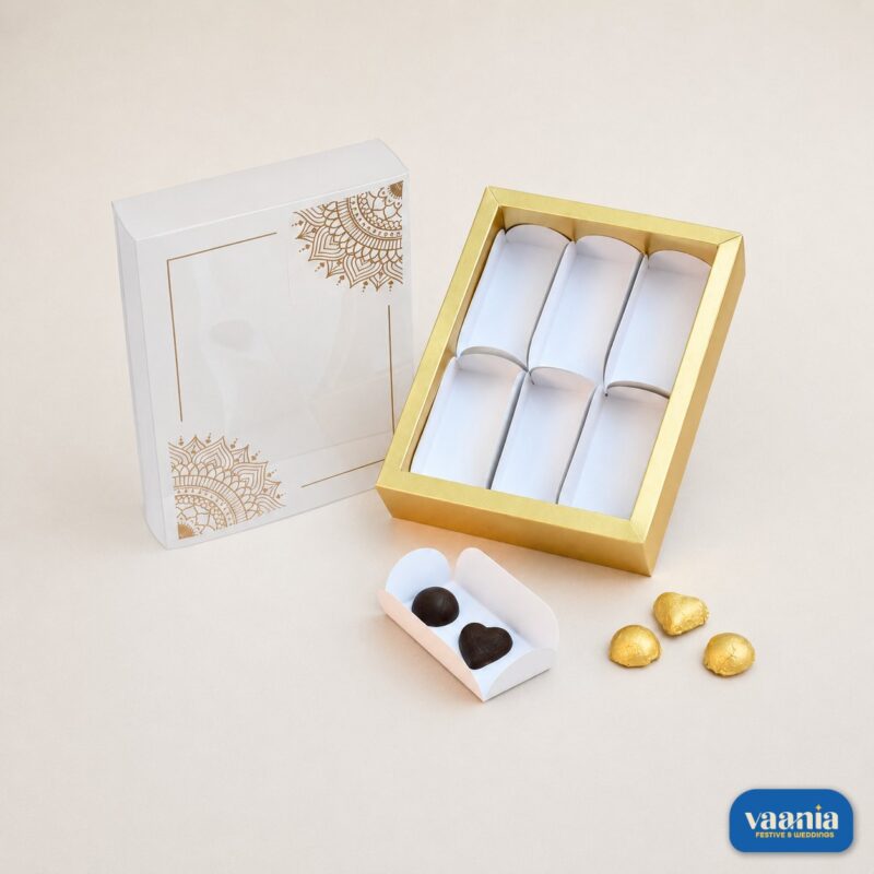 Sliding Box Cavity PVC Box with gold frame and mandala sleeve next to heart shaped chocolates