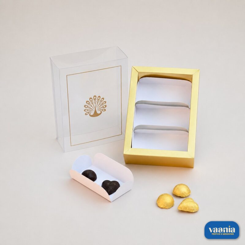 Gold Sliding Box - Cavity PVC Box with 3 Big Cavities featuring a peacock logo and chocolates